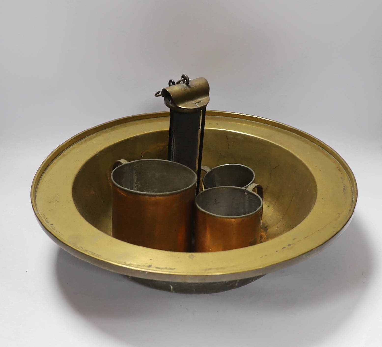 A miner's brass Davy lamp, signed E.Thomas & Williams, a large brass bowl and three graduated copper measures